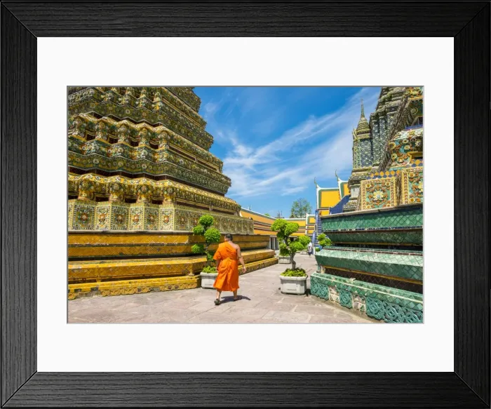 Framed Print : A monk walks past stupas at Wat Pho (Temple of the Reclining Buddha), Bangkok, Thailand Framed Print : A monk walks past stupas at Wat Pho (Temple of the Reclining Buddha), Bangkok, Thailand