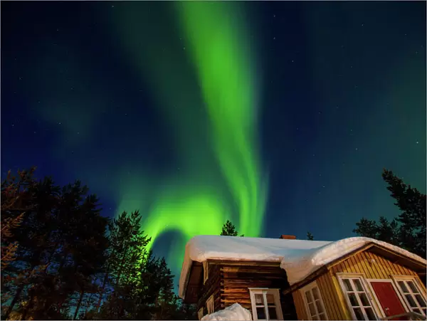 Aurora Borealis (the Northern Lights) over Kakslauttanen Igloo West Village, Saariselka