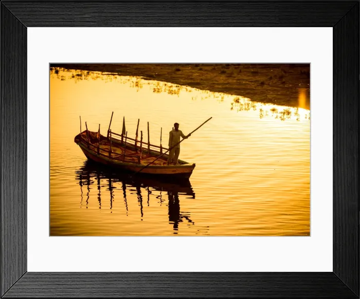 Framed Print : Silhouette of Indian gondolier during the Flower Holi Festival, Vrindavan, Uttar Pradesh Framed Print : Silhouette of Indian gondolier during the Flower Holi Festival, Vrindavan, Uttar Pradesh