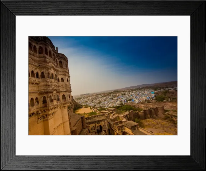 Framed Print : The view from the main courtyard of Mehrangarh Fort towering over the blue rooftops in Jodhpur Framed Print : The view from the main courtyard of Mehrangarh Fort towering over the blue rooftops in Jodhpur