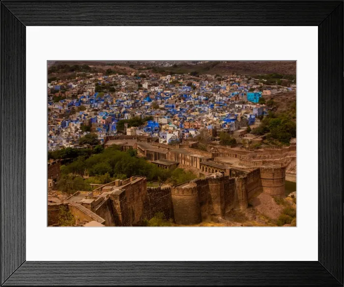 Framed Print : The palace walls of Mehrangarh Fort towering over the blue rooftops in Jodhpur, the Blue City Framed Print : The palace walls of Mehrangarh Fort towering over the blue rooftops in Jodhpur, the Blue City