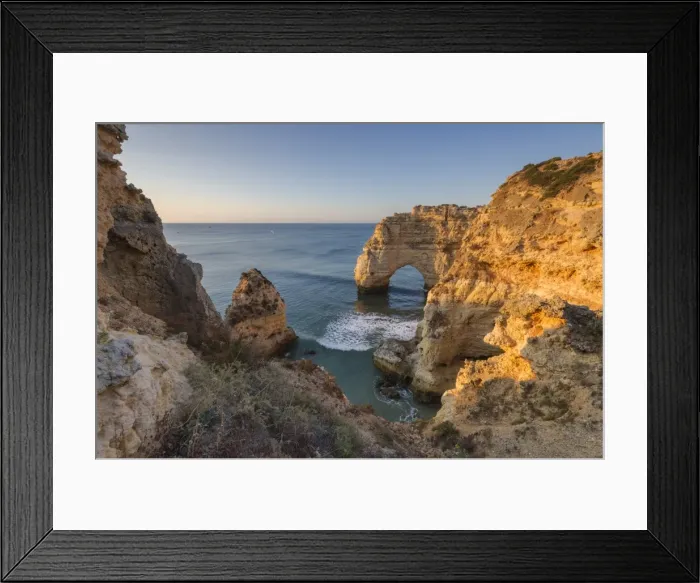 Framed Print : Sunrise on the cliffs and turquoise water of the ocean, Praia da Marinha, Caramujeira Framed Print : Sunrise on the cliffs and turquoise water of the ocean, Praia da Marinha, Caramujeira