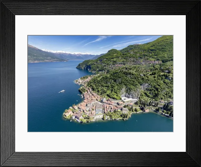 Framed Print : Aerial view of the picturesque village of Varenna surrounded by Lake Como and gardens Framed Print : Aerial view of the picturesque village of Varenna surrounded by Lake Como and gardens