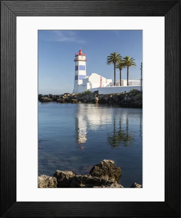 Framed Print : The lighthouse reflected in the blue water under the blue summer sky, Cascais, Estoril Coast Framed Print : The lighthouse reflected in the blue water under the blue summer sky, Cascais, Estoril Coast