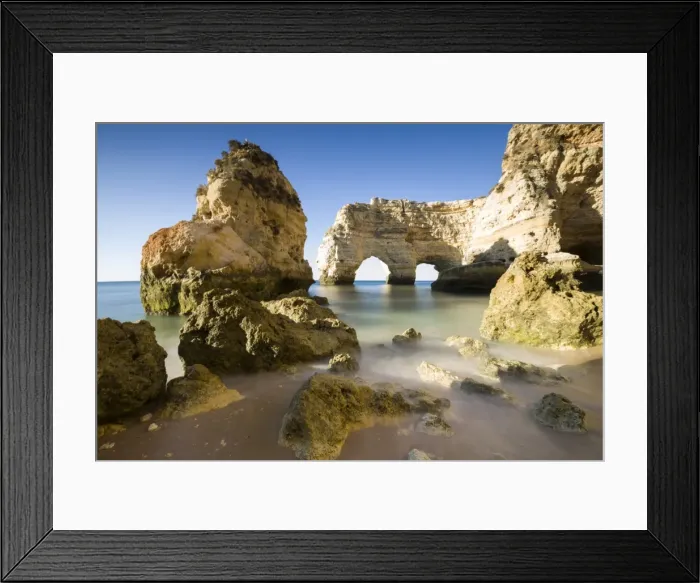 Framed Print : Sunrise on the cliffs and turquoise water of the ocean, Praia da Marinha, Caramujeira Framed Print : Sunrise on the cliffs and turquoise water of the ocean, Praia da Marinha, Caramujeira