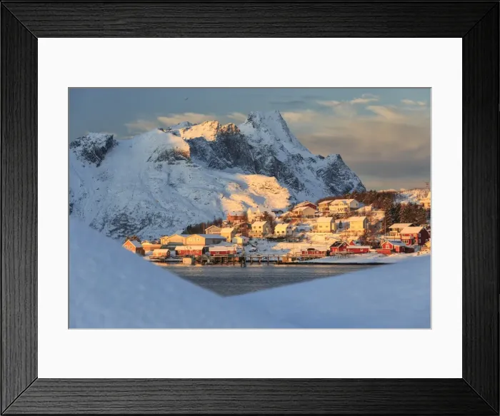 Framed Print : The last rays of sun on the fishing village and the snowy peaks, Kvalvika, Andoya Framed Print : The last rays of sun on the fishing village and the snowy peaks, Kvalvika, Andoya