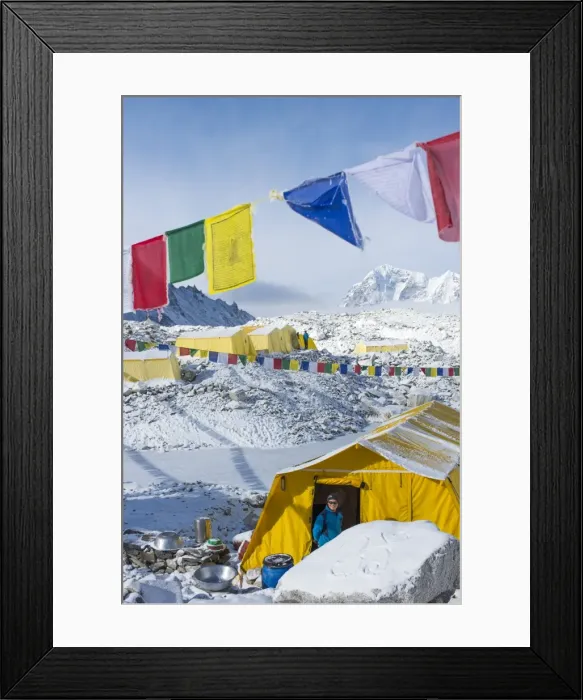 Framed Print : Prayer flags and the Everest base camp at the end of the Khumbu glacier that lies at 5350m