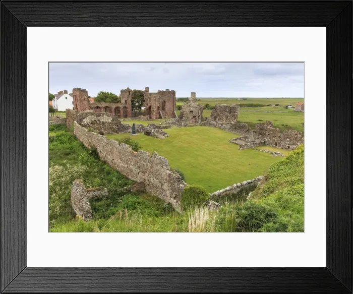 Framed Print : Lindisfarne Priory, early Christian site, and village, elevated view, Holy Island Framed Print : Lindisfarne Priory, early Christian site, and village, elevated view, Holy Island