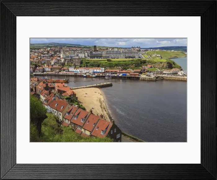 Framed Print : Tate Hill Beach, red roofed houses, town on West Cliff with backdrop of green hills in summer Framed Print : Tate Hill Beach, red roofed houses, town on West Cliff with backdrop of green hills in summer