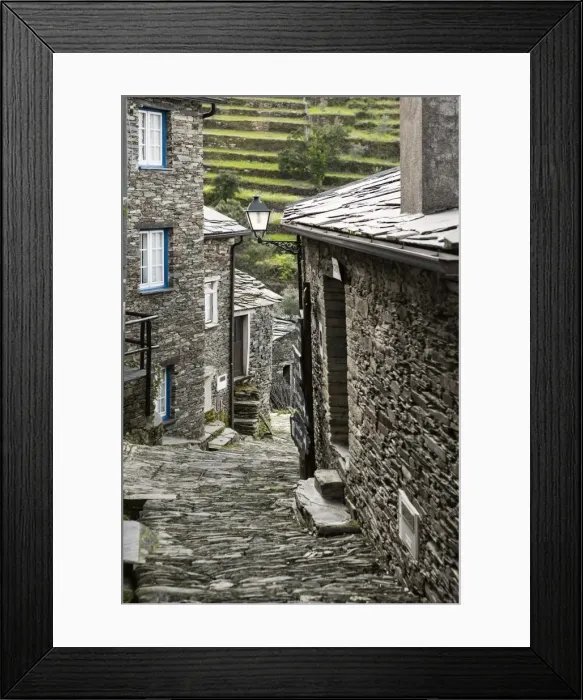 Framed Print : Cobbled streets and granite houses in the medieval village of Piodao in the Serra