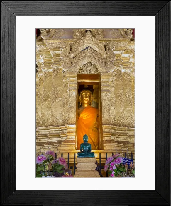 Framed Print : Emerald Buddha and golden Buddha in the main bot of historic Wat Phra That Lampang Luang temple