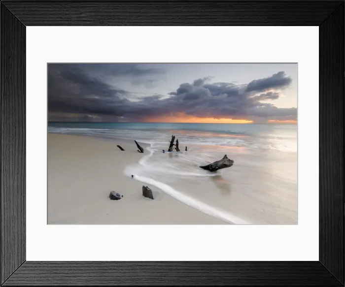 Framed Print : Caribbean sunset frames tree trunks on Ffryes Beach, Antigua, Antigua and Barbuda Framed Print : Caribbean sunset frames tree trunks on Ffryes Beach, Antigua, Antigua and Barbuda