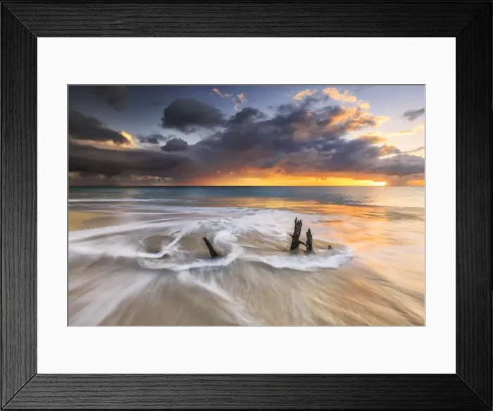 Framed Print : The waves and caribbean sunset frames tree trunks on Ffryes Beach, Antigua, Antigua and Barbuda Framed Print : The waves and caribbean sunset frames tree trunks on Ffryes Beach, Antigua, Antigua and Barbuda
