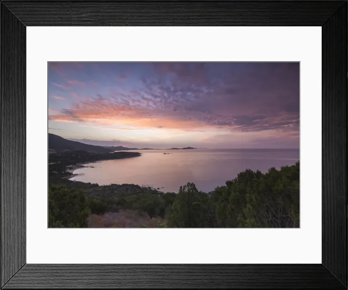 Framed Print : The colors of sunrise are reflected on the sea around the beach of Solanas, Villasimius Framed Print : The colors of sunrise are reflected on the sea around the beach of Solanas, Villasimius