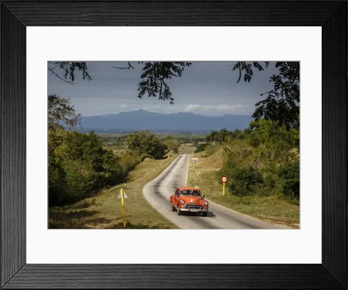Framed Print : Old vintage American car on a road outside Trinidad, Sancti Spiritus Province, Cuba Framed Print : Old vintage American car on a road outside Trinidad, Sancti Spiritus Province, Cuba