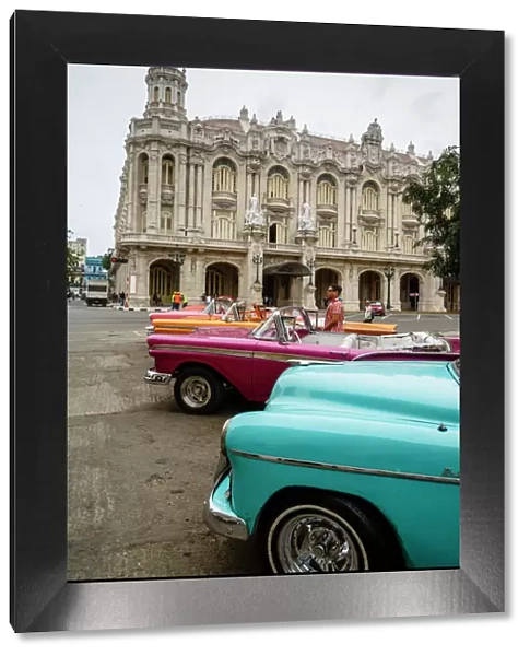 Vintage American cars parked outside the Gran Teatro (Grand Theater), Havana, Cuba