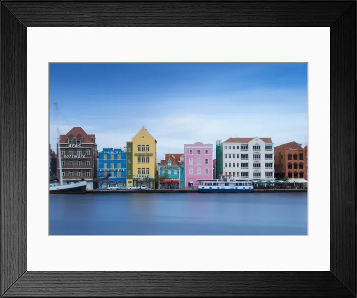 Framed Print : View of St. Anna Bay looking towards colonial merchant houses lining Handelskade Framed Print : View of St. Anna Bay looking towards colonial merchant houses lining Handelskade