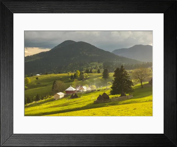 Framed Print : Farm and haystacks in the rural Transylvania landscape at sunset, Piatra Fantanele Framed Print : Farm and haystacks in the rural Transylvania landscape at sunset, Piatra Fantanele