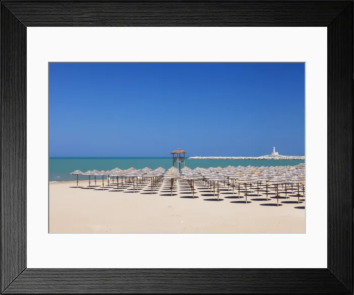 Framed Print : View over Spiaggia di San Lorenzo beach to the lighthouse on Isola di Sant Eufemia Island Framed Print : View over Spiaggia di San Lorenzo beach to the lighthouse on Isola di Sant Eufemia Island