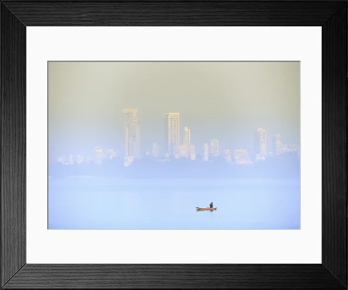 Framed Print : A fisherman in front of the skyscrapers of the Malabar Hills in Mumbai (Bombay), Maharashtra Framed Print : A fisherman in front of the skyscrapers of the Malabar Hills in Mumbai (Bombay), Maharashtra