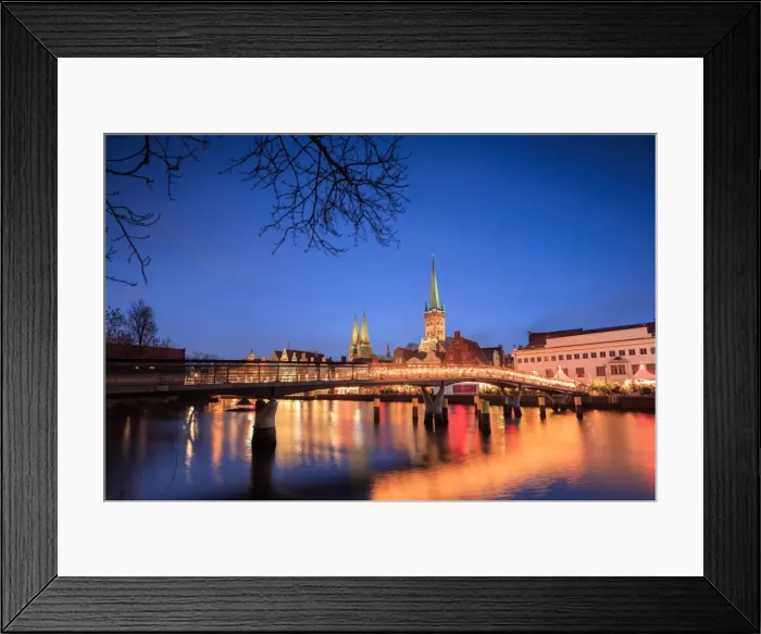 Framed Print : The lights of dusk on typical bridge and the cathedral reflected in River Trave, Lubeck Framed Print : The lights of dusk on typical bridge and the cathedral reflected in River Trave, Lubeck