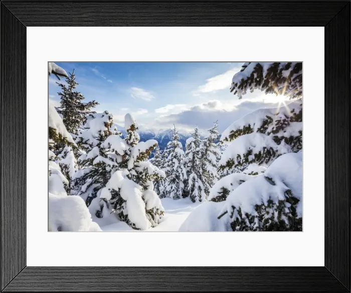 Framed Print : Sunbeam in the snowy woods framed by the winter sunset, Bettmeralp, district of Raron Framed Print : Sunbeam in the snowy woods framed by the winter sunset, Bettmeralp, district of Raron