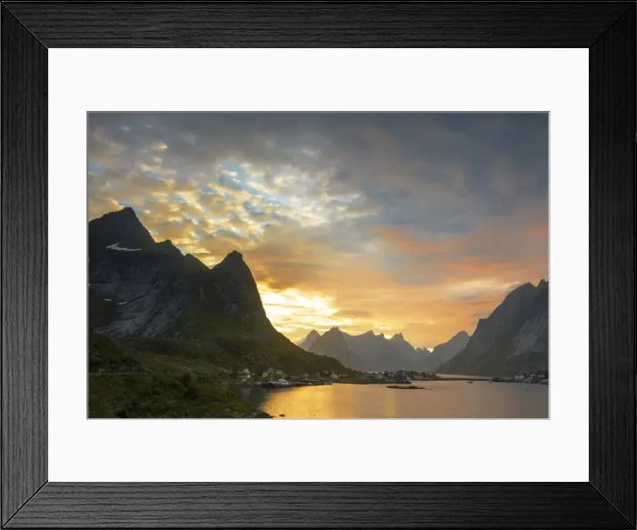 Framed Print : Sunset on the fishing village surrounded by rocky peaks and sea, Reine, Nordland county Framed Print : Sunset on the fishing village surrounded by rocky peaks and sea, Reine, Nordland county