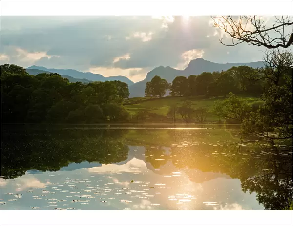Sunset at Loughrigg Tarn near Ambleside in The Lake District National Park, Cumbria