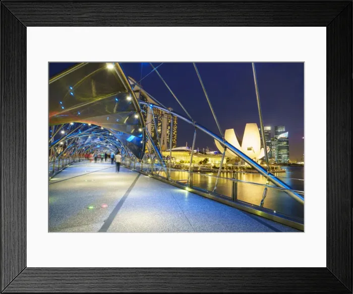Framed Print : People strolling on the Helix Bridge towards the Marina Bay Sands and ArtScience Museum at night Framed Print : People strolling on the Helix Bridge towards the Marina Bay Sands and ArtScience Museum at night