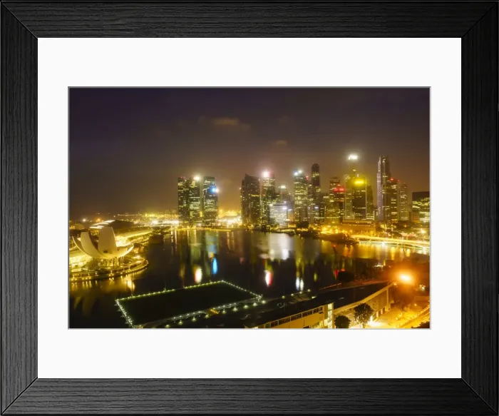 Framed Print : The towers of the Central Business District and Marina Bay by night, Singapore, Southeast Asia Framed Print : The towers of the Central Business District and Marina Bay by night, Singapore, Southeast Asia