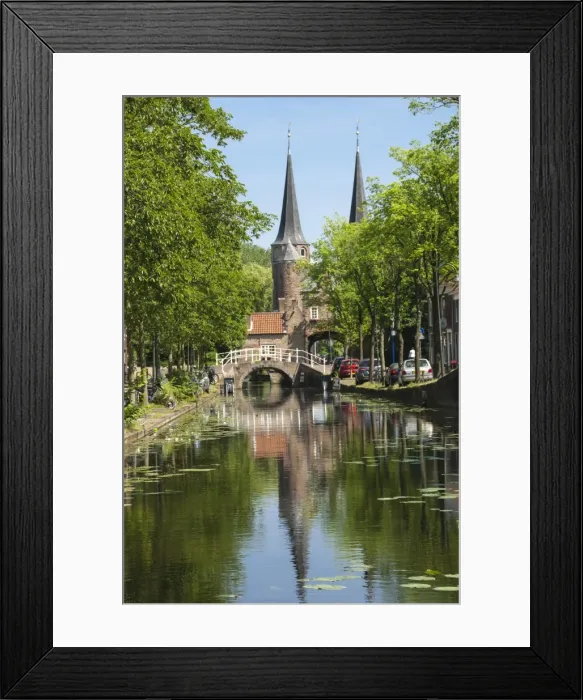 Framed Print : Canal scene with bridge, 16th century East Port Gate Towers, Delft, Holland, Europe Framed Print : Canal scene with bridge, 16th century East Port Gate Towers, Delft, Holland, Europe