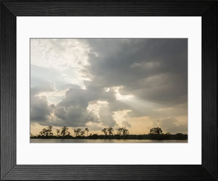 Framed Print : Sunburst through clouds on the Pacaya River, Upper Amazon River Basin, Loreto, Peru Framed Print : Sunburst through clouds on the Pacaya River, Upper Amazon River Basin, Loreto, Peru