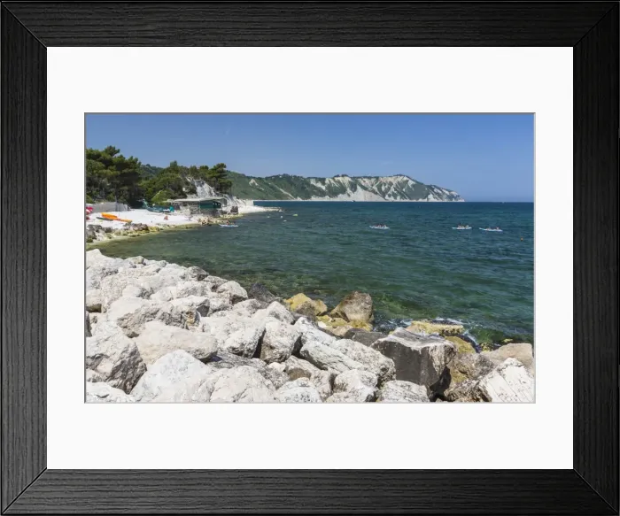 Framed Print : Canoe in the bay surrounded by the turquoise sea, Province of Ancona, Conero Riviera Framed Print : Canoe in the bay surrounded by the turquoise sea, Province of Ancona, Conero Riviera