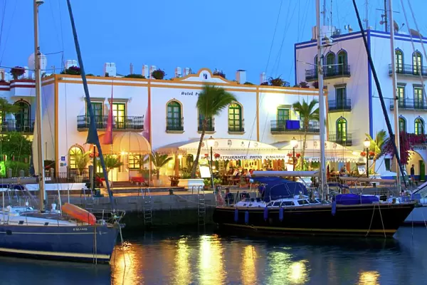 Restaurants in Puerto de Morgan at dusk, Gran Canaria, Canary Islands, Spain, Atlantic Ocean