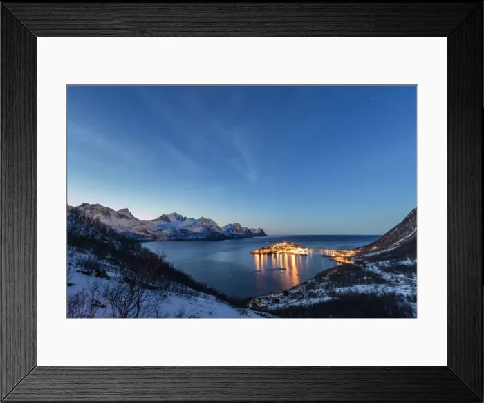 Framed Print : Lights on the typical fishing village framed by the frozen sea at dusk, Husoy, Fjordbotn Framed Print : Lights on the typical fishing village framed by the frozen sea at dusk, Husoy, Fjordbotn