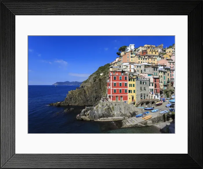 Framed Print : Tiny harbour and medieval houses in steep ravine, Riomaggiore, Cinque Terre, UNESCO Framed Print : Tiny harbour and medieval houses in steep ravine, Riomaggiore, Cinque Terre, UNESCO