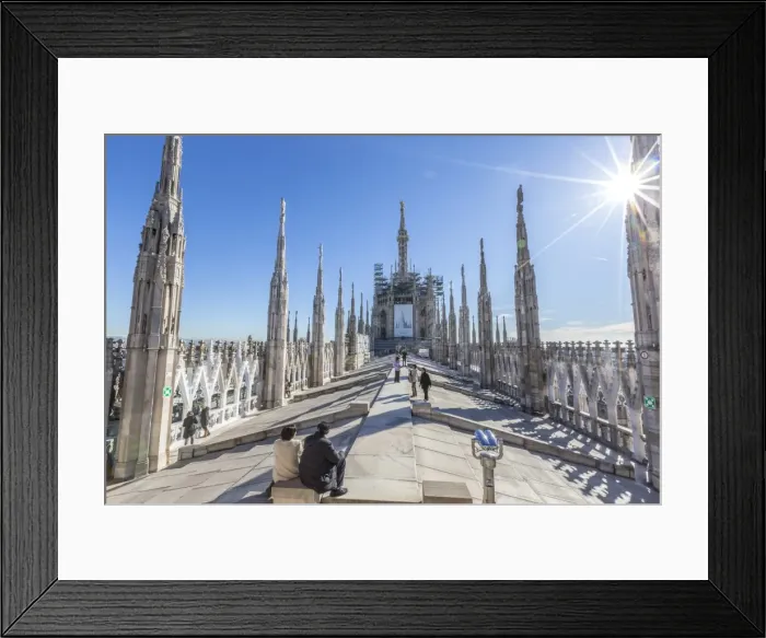 Framed Print : Tourists among the white marble spiers on the top of the Duomo, Milan, Lombardy, Italy Framed Print : Tourists among the white marble spiers on the top of the Duomo, Milan, Lombardy, Italy