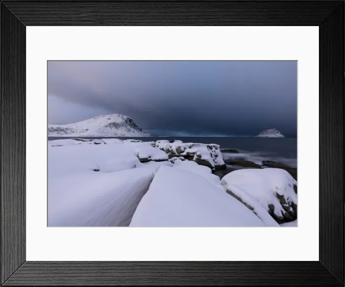 Framed Print : Storm clouds on the snowy peaks reflected in the cold sea at night, Haukland, Lofoten Islands Framed Print : Storm clouds on the snowy peaks reflected in the cold sea at night, Haukland, Lofoten Islands
