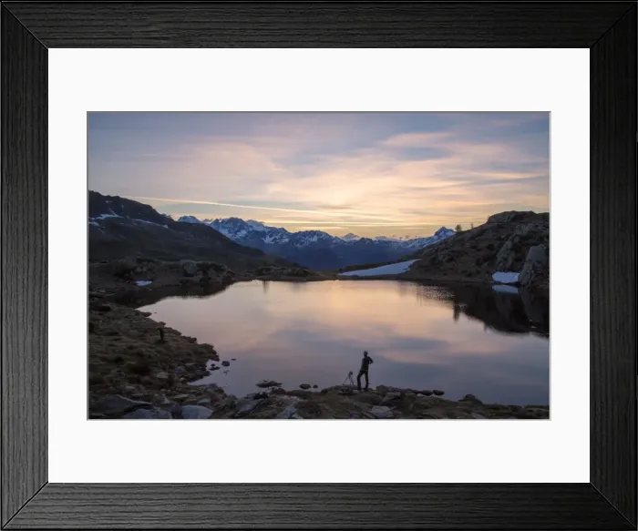 Framed Print : Photographer admires the pink sunrise on Lake Zana, Malenco Valley, Valtellina, Province of Sondrio Framed Print : Photographer admires the pink sunrise on Lake Zana, Malenco Valley, Valtellina, Province of Sondrio