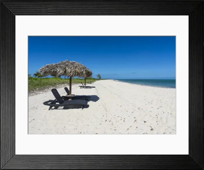 Framed Print : Sun lounger on a white sand beach in northern Providenciales, Turks and Caicos, Caribbean Framed Print : Sun lounger on a white sand beach in northern Providenciales, Turks and Caicos, Caribbean