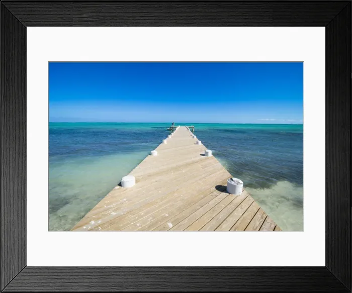Framed Print : Long wooden pier in the turquoise waters of Providenciales, Turks and Caicos, Caribbean Framed Print : Long wooden pier in the turquoise waters of Providenciales, Turks and Caicos, Caribbean