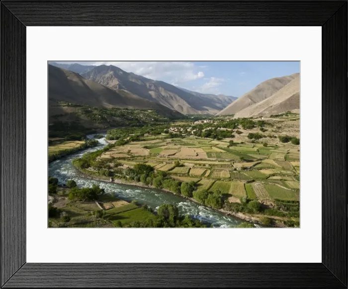 Framed Print : The green of the irrigated fields contrasts with the arid hills above, a testament Framed Print : The green of the irrigated fields contrasts with the arid hills above, a testament