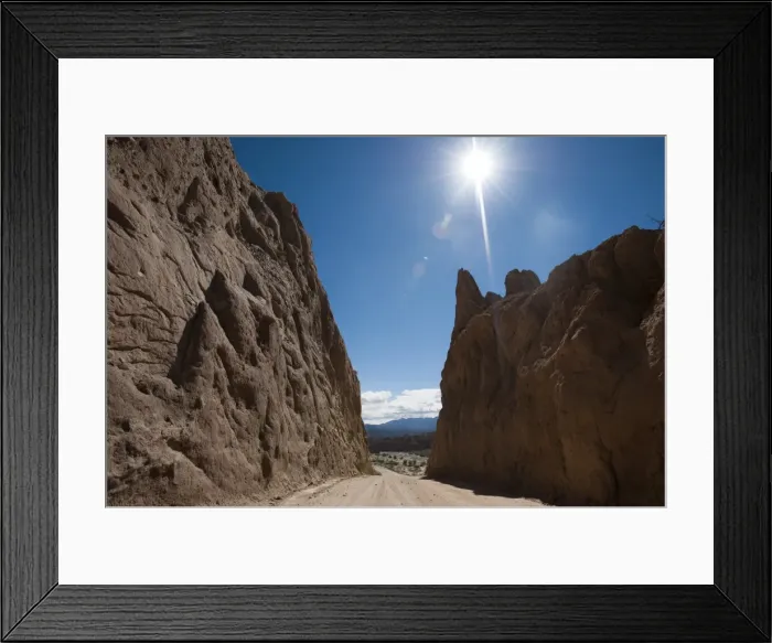 Framed Print : Road passing through dramatic rock formations of Calchaqui valleys, Argentina, South Framed Print : Road passing through dramatic rock formations of Calchaqui valleys, Argentina, South