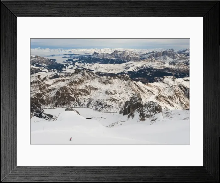 Framed Print : Skiers descend from the top of Marmolada in the Dolomites, Italy, Europe Framed Print : Skiers descend from the top of Marmolada in the Dolomites, Italy, Europe