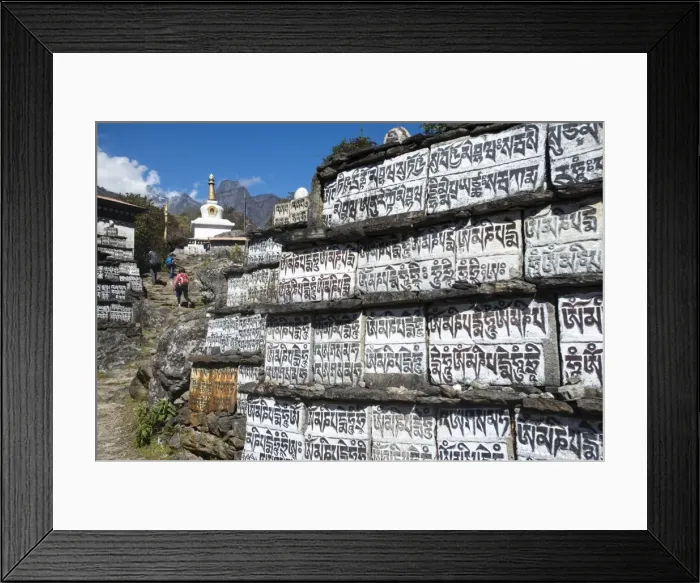 Framed Print : Mani stones inscribed with an ancient Buddhist mantra decorate the trail to Everest Base Camp Framed Print : Mani stones inscribed with an ancient Buddhist mantra decorate the trail to Everest Base Camp