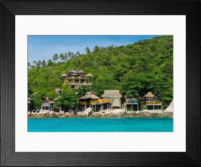 Framed Print : A traditional Thai resort overlooks turquoise water on the tropical island of Koh Tao Framed Print : A traditional Thai resort overlooks turquoise water on the tropical island of Koh Tao