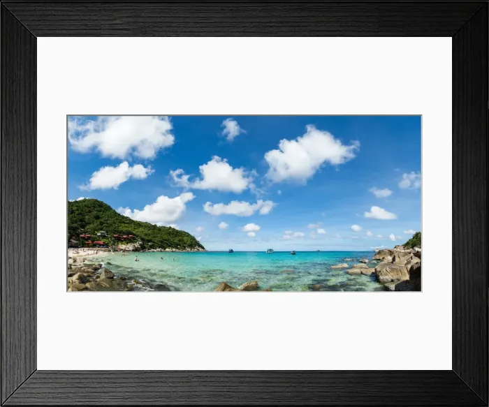 Framed Print : Toursits enjoy the clear water and sun at a beach on the Thai island of Koh Tao, Thailand Framed Print : Toursits enjoy the clear water and sun at a beach on the Thai island of Koh Tao, Thailand