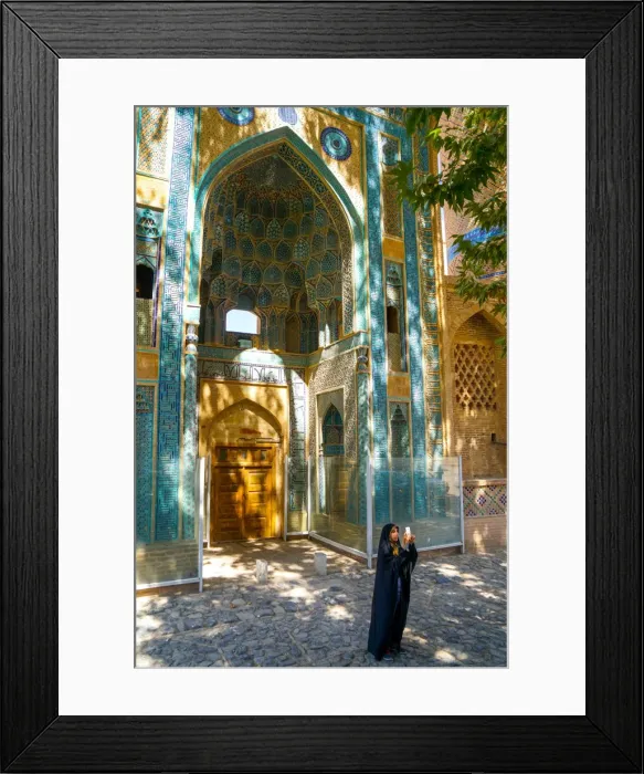 Framed Print : Young Iranian girl in chador taking picture in front of Jameh Mosque, Natanz, Iran Framed Print : Young Iranian girl in chador taking picture in front of Jameh Mosque, Natanz, Iran