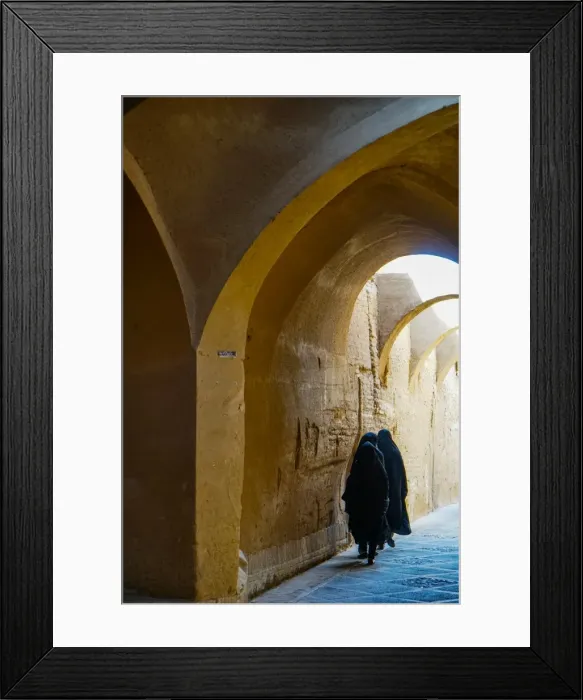 Framed Print : Three women in chadors hurrying down typical vaulted alleyway, Yazd, Iran, Middle East Framed Print : Three women in chadors hurrying down typical vaulted alleyway, Yazd, Iran, Middle East