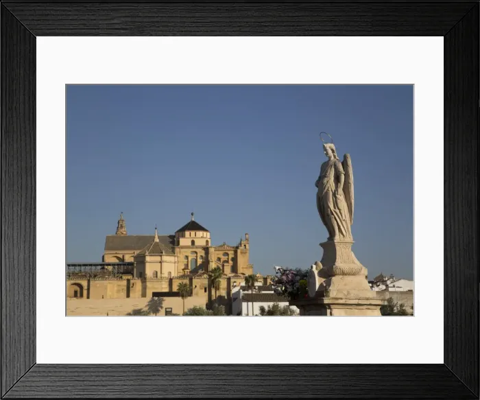 Framed Print : Statue of Raphael the Archangel with the Great Mosque (Mesquita) and Cathedral of Framed Print : Statue of Raphael the Archangel with the Great Mosque (Mesquita) and Cathedral of